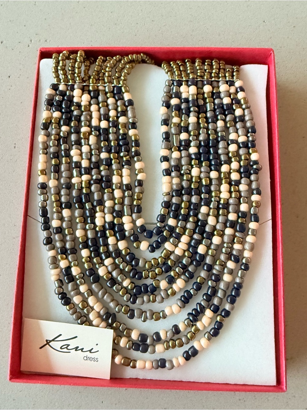 Kani Dress Multistrand Beaded Necklace in Black, Cream & Gold